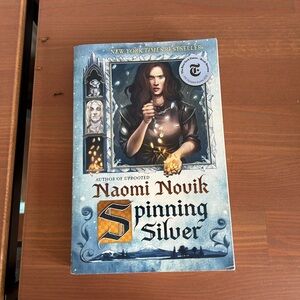 Free with purchase: Spinning Silver by Naomi Novik
